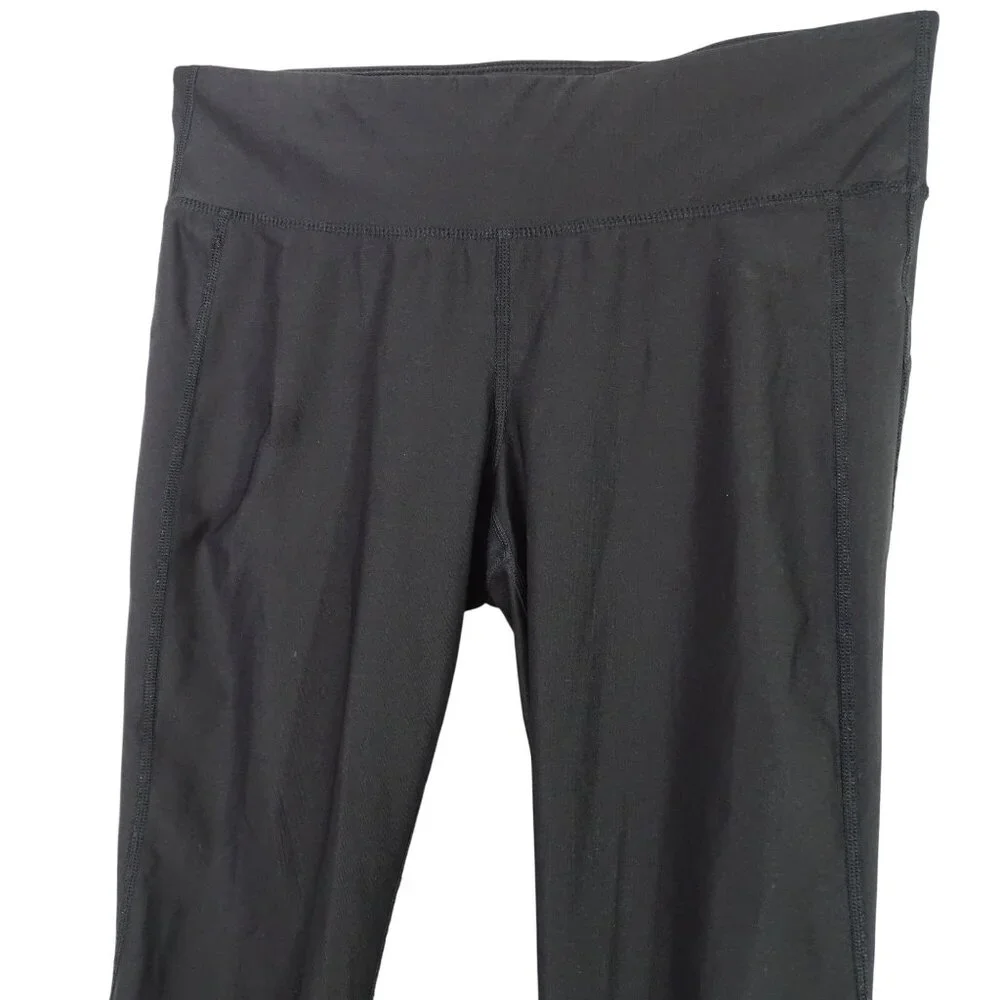 Xersion Black Cropped Athletic Leggings Women Size M Zippered Pocket Reflective